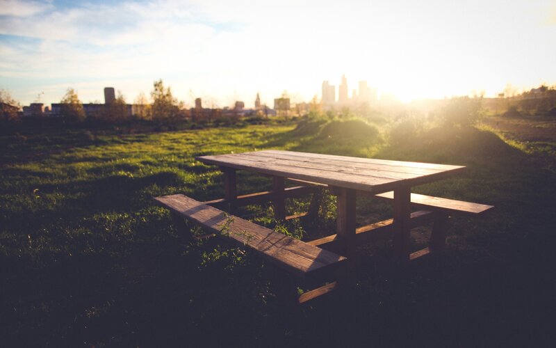 Wooden Picnic Table — Green, Serene, Sunset