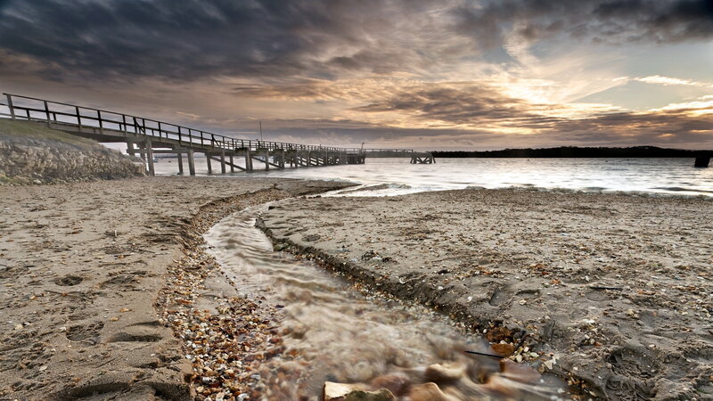 Wooden Pier at Beach — Gray