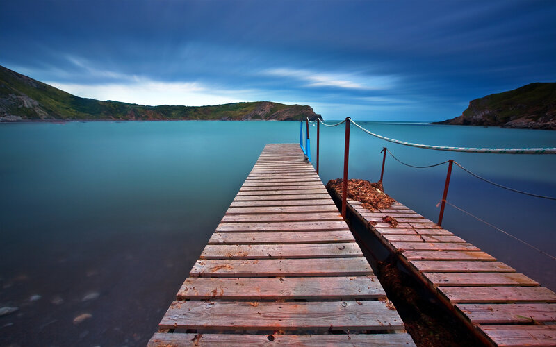 Wooden pier at coastal inlet