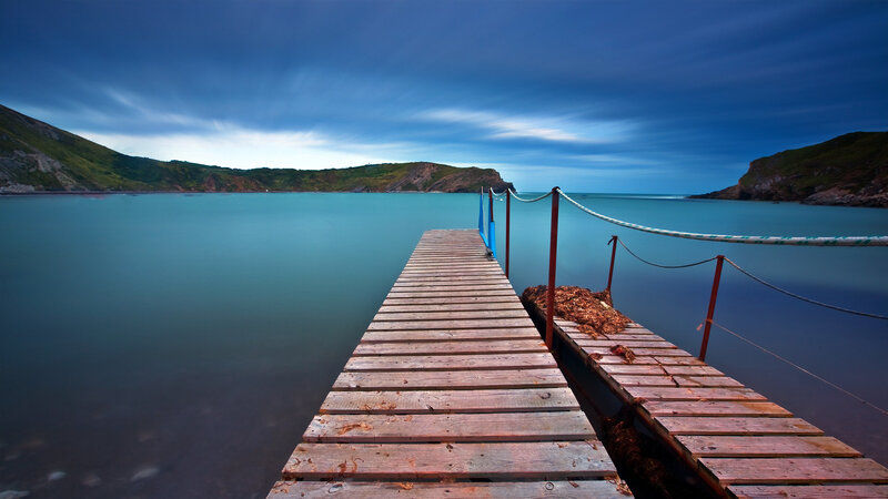 Wooden pier at coastal inlet