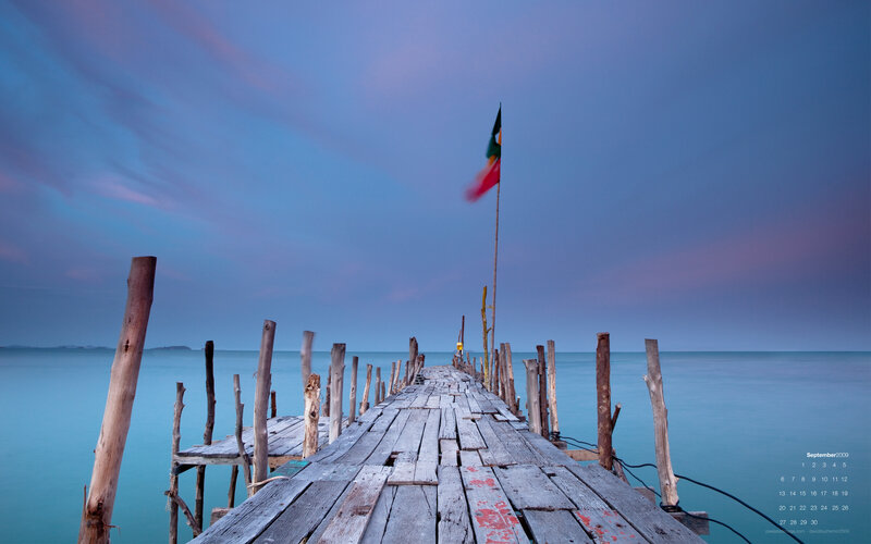 Wooden Pier at Dusk — Blue, Serene, Sunset, Photograph, Flag