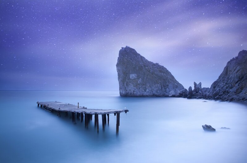 Wooden Pier at Night — Blue, Serene, Photograph, Rock Formations