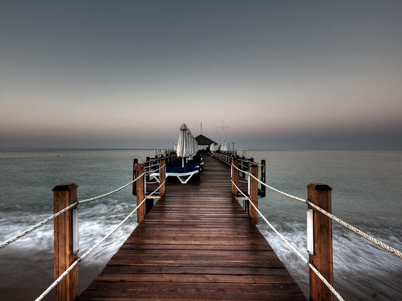 Wooden Pier at Sea — Brown