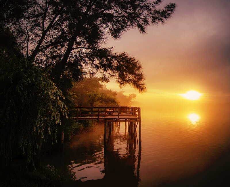 Wooden Pier at Sunrise — Orange, Serene, Photograph, Tree