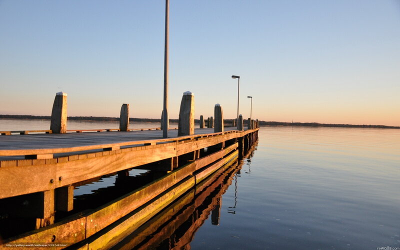 Wooden pier at sunset