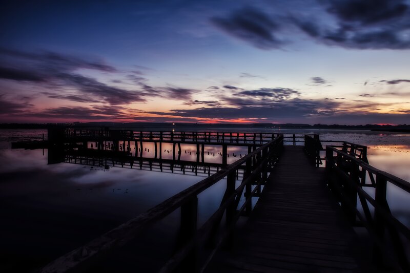 Wooden pier at sunset