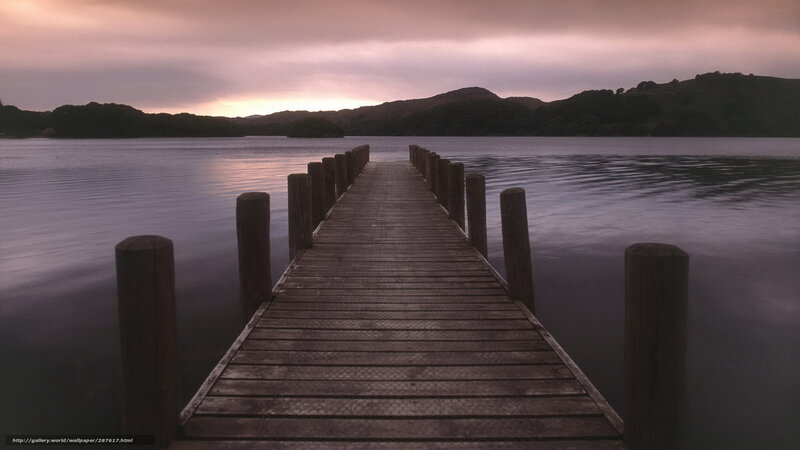 Wooden pier at sunset