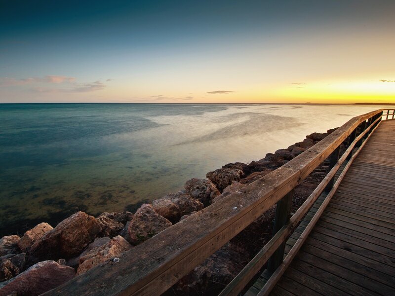 Wooden pier at sunset