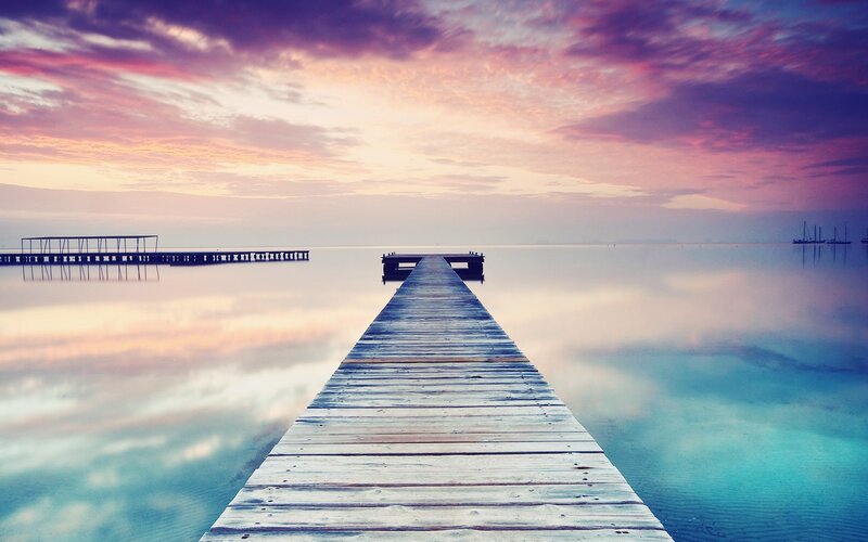 Wooden pier at sunset