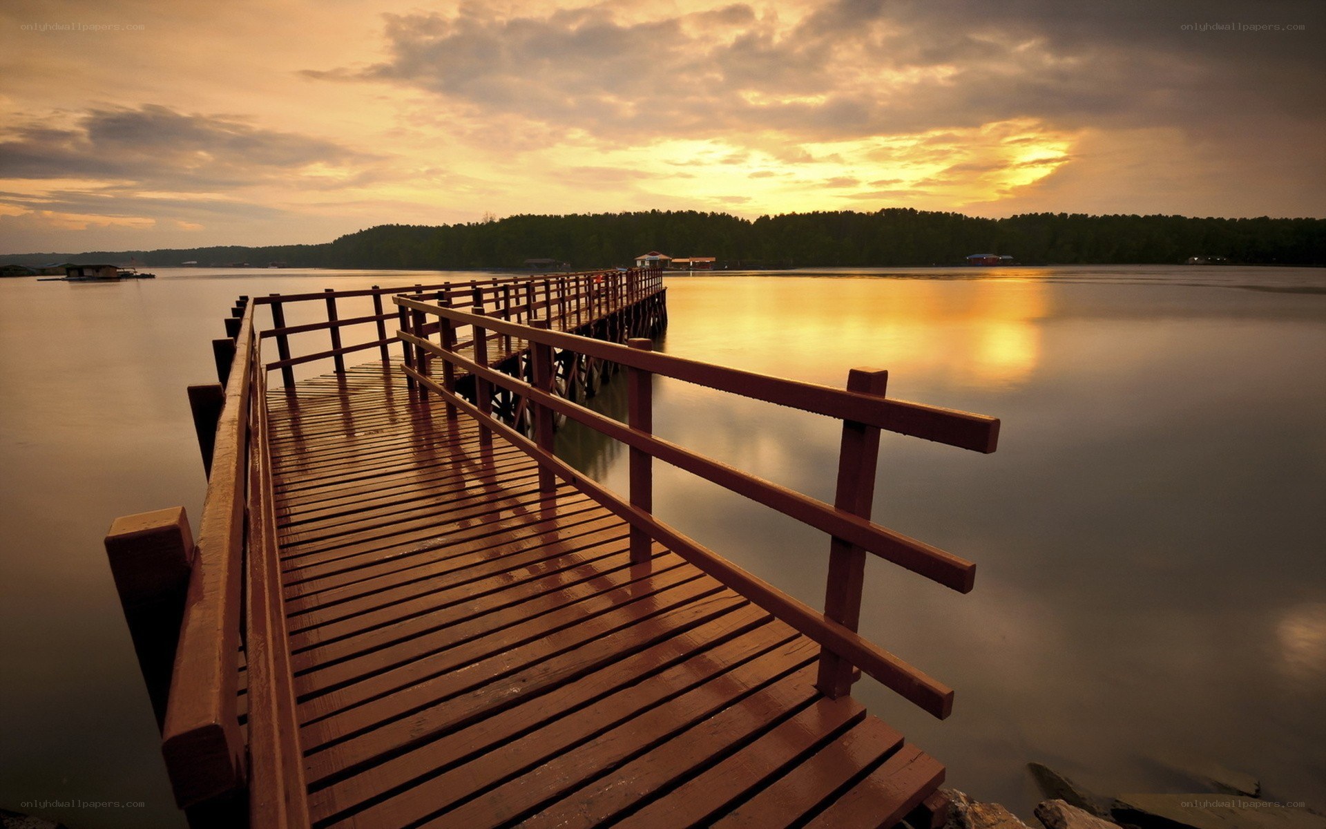 Wooden pier at sunset