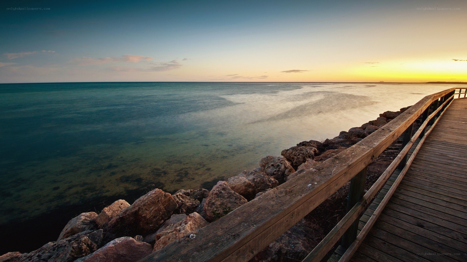 Wooden pier at sunset