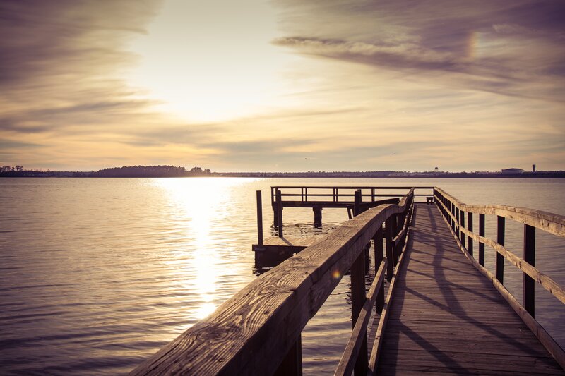 Wooden pier at sunset