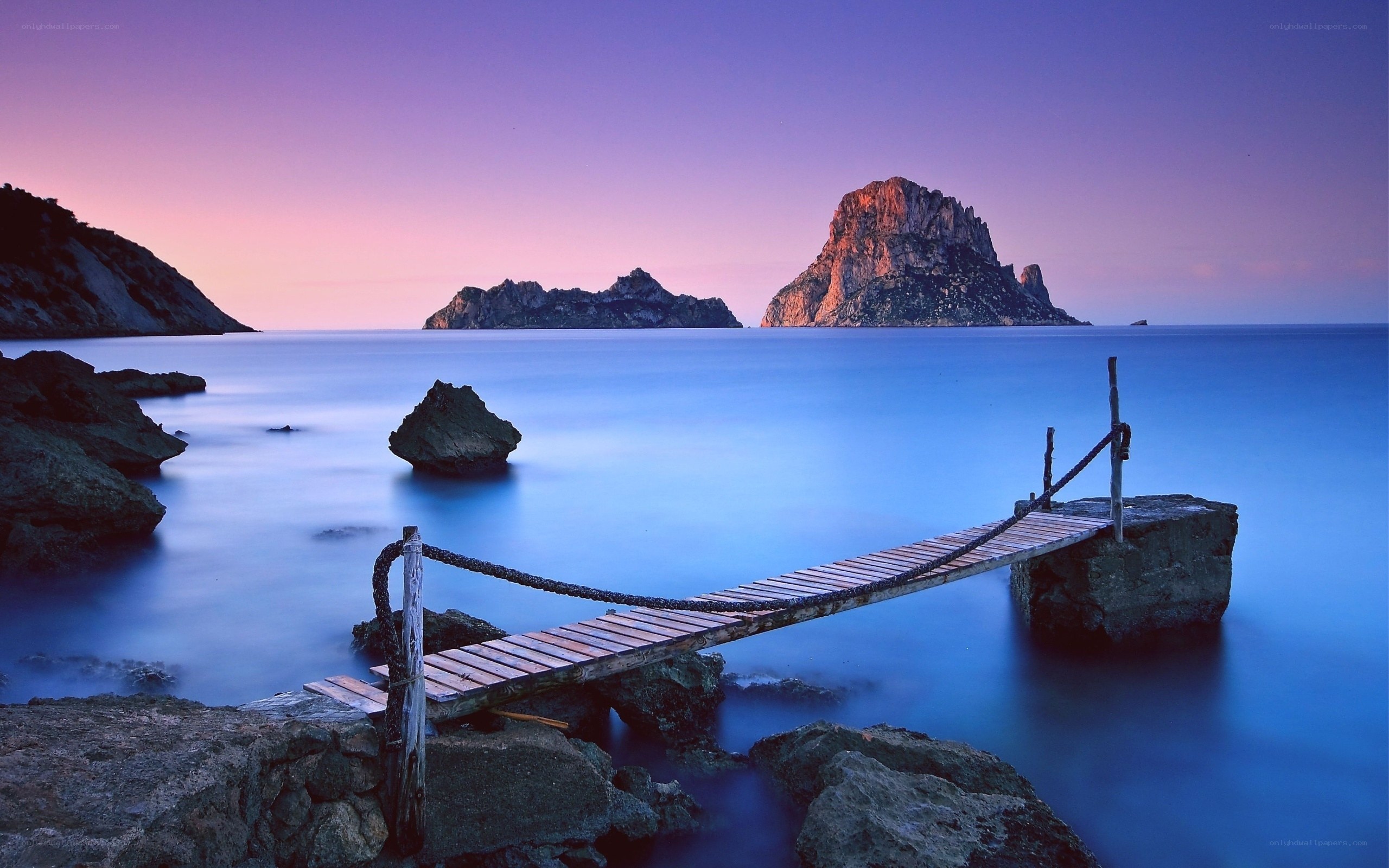 Wooden pier at sunset