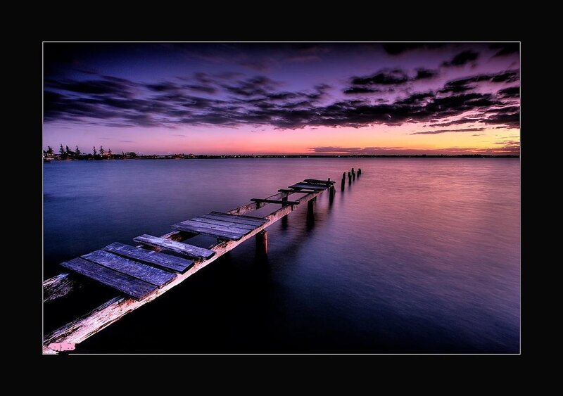 Wooden pier at sunset