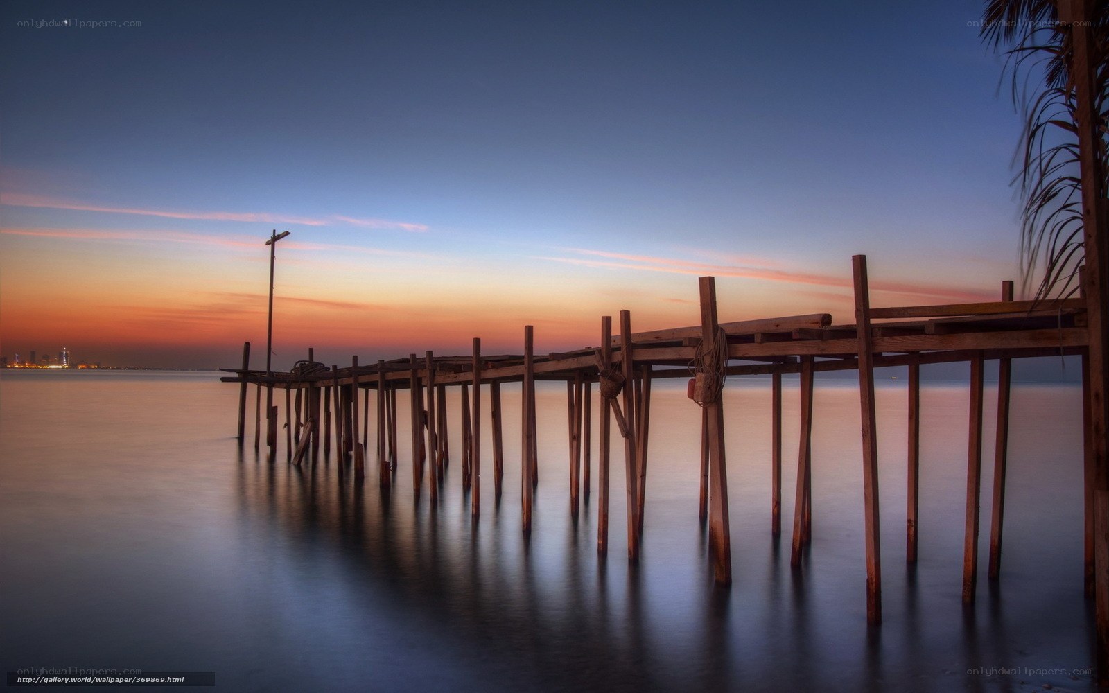 Wooden pier at sunset