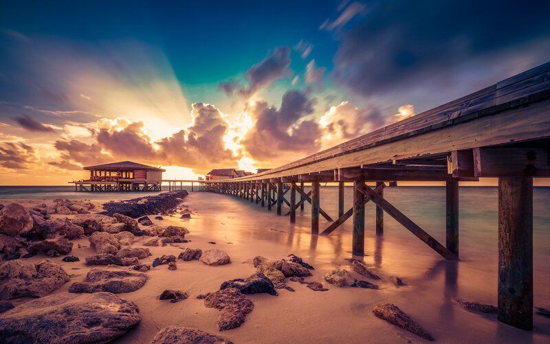 Wooden Pier at Sunset — Blue, Dramatic, Photograph, Beach, Clouds, Sun