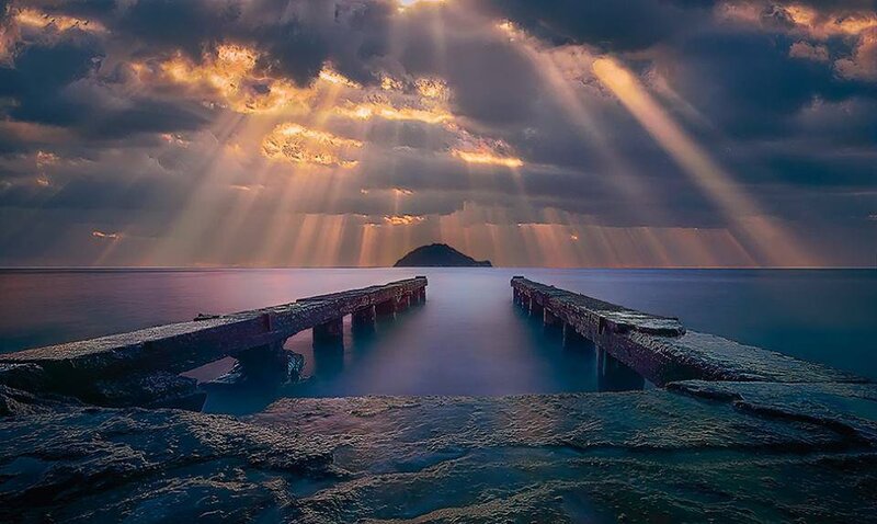 Wooden Pier at Sunset — Blue, Dramatic, Photograph, Clouds, Sunbeams