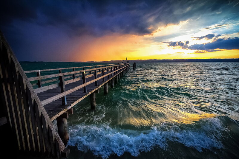 Wooden Pier at Sunset — Blue, Dramatic, Photograph, Ocean, Sky, Waves