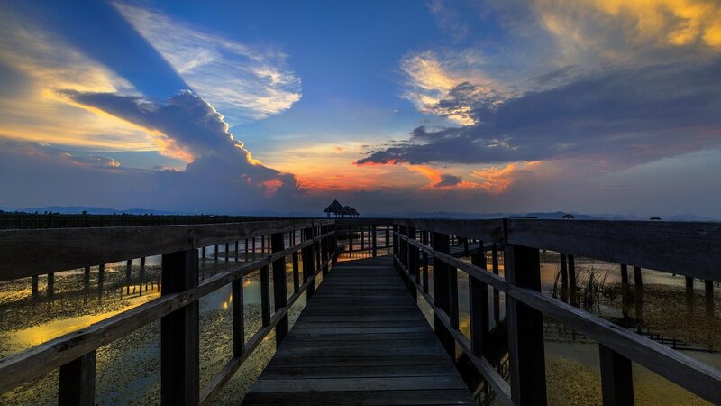 Wooden Pier at Sunset — Blue, Dramatic, Photograph, Sky, Clouds, Mountains