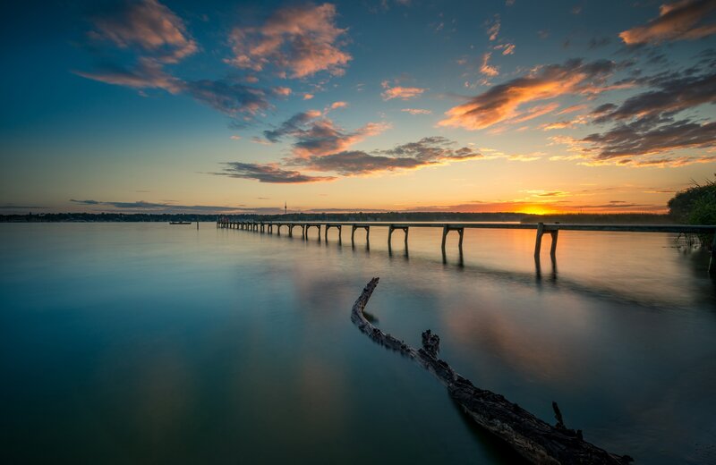 Wooden Pier at Sunset — Blue, Serene, Photograph, Driftwood