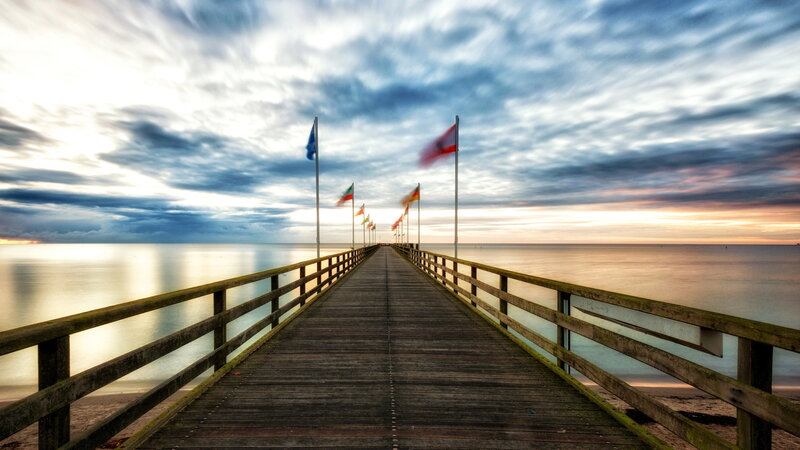 Wooden Pier at Sunset — Blue, Serene, Photograph, Flags, Ocean