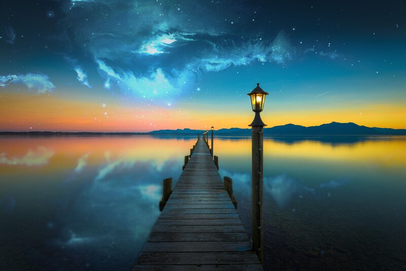 Wooden Pier at Sunset — Blue, Serene, Photograph, Lamp Post, Mountains