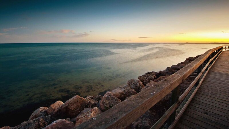 Wooden Pier at Sunset — Blue, Serene, Photograph, Ocean, Rocks, Sky