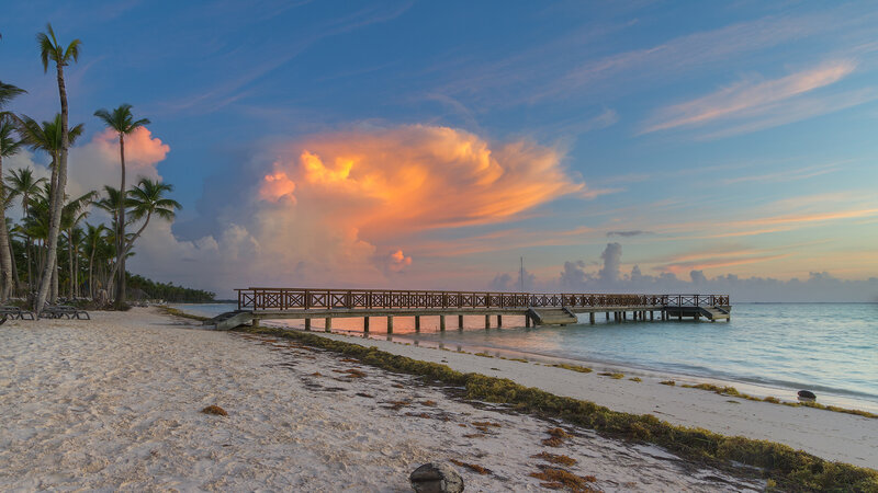 Wooden Pier at Sunset — Blue, Serene, Photograph, Palm Trees, Clouds
