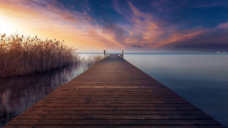 Wooden Pier at Sunset — Blue, Serene, Photograph, Reeds