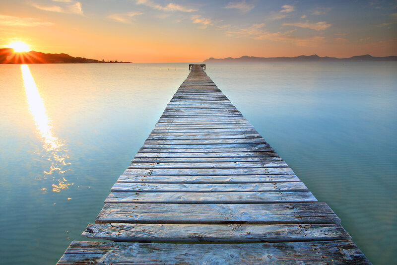 Wooden Pier at Sunset — Blue, Serene, Photograph, Sun
