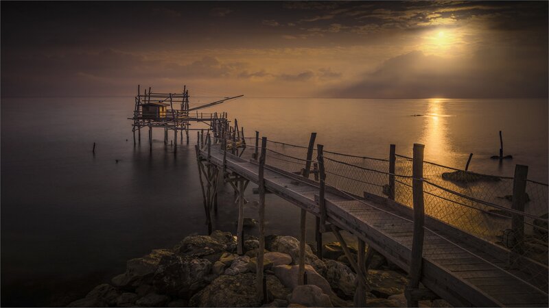 Wooden Pier at Sunset — Gold, Serene, Photograph, Fishing Hut