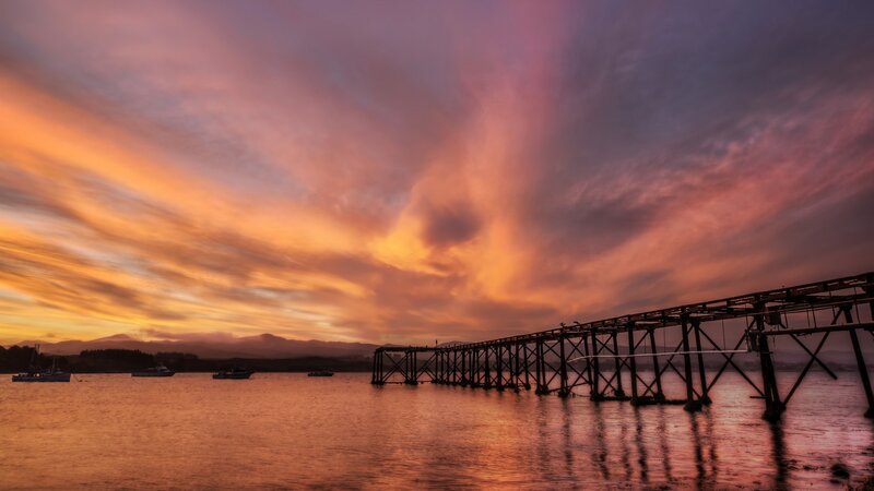 Wooden Pier at Sunset — Orange, Dramatic, Photograph, Boats, Mountains
