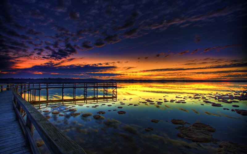 Wooden Pier at Sunset — Orange, Dramatic, Photograph, Water, Sky, Rocks
