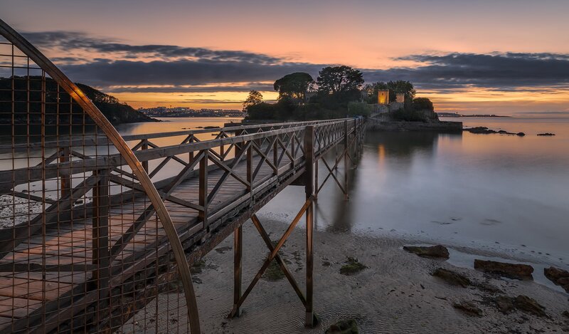 Wooden Pier at Sunset — Orange, Serene, Photograph, Castle