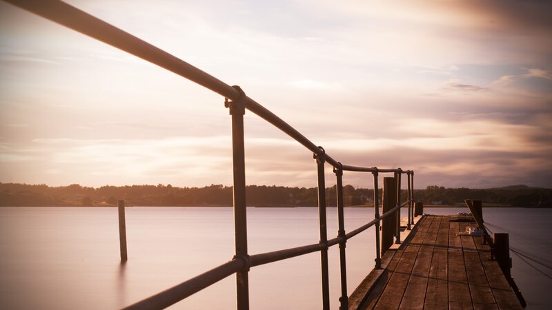 Wooden Pier at Sunset — Orange, Serene, Photograph, Railing, Water