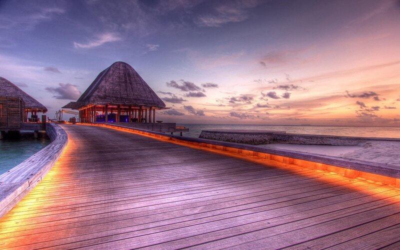 Wooden Pier at Sunset — Orange, Serene, Photograph, Thatched Hut
