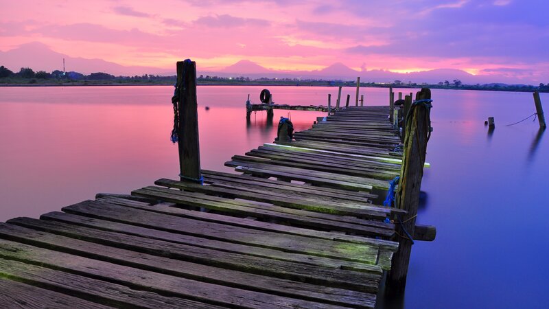 Wooden Pier at Sunset — Pink, Serene, Photograph, Mountains