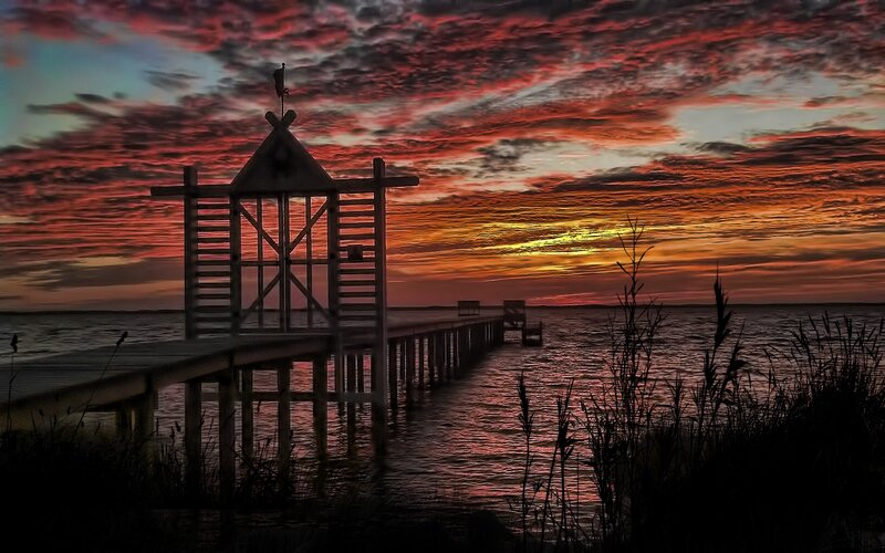 Wooden Pier at Sunset — Red, Dramatic, Photograph, Sky, Water, Plants, Orange