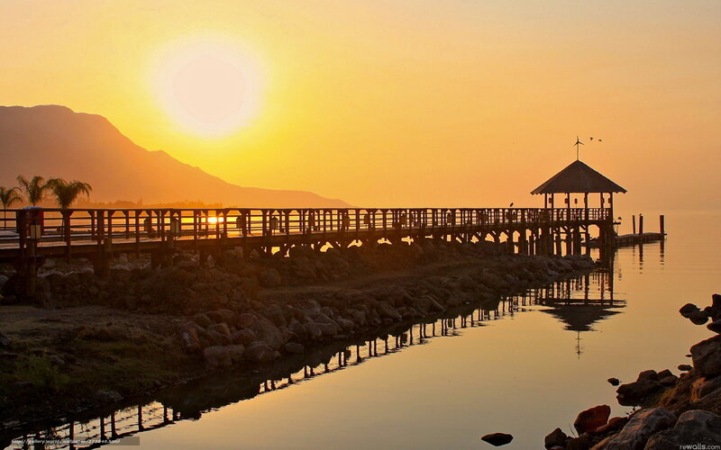 Wooden Pier at Sunset — Yellow, Serene, Photograph, Mountain