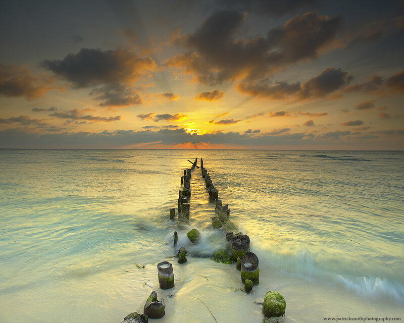 Wooden Pier at Sunset — Yellow, Serene, Photograph, Ocean