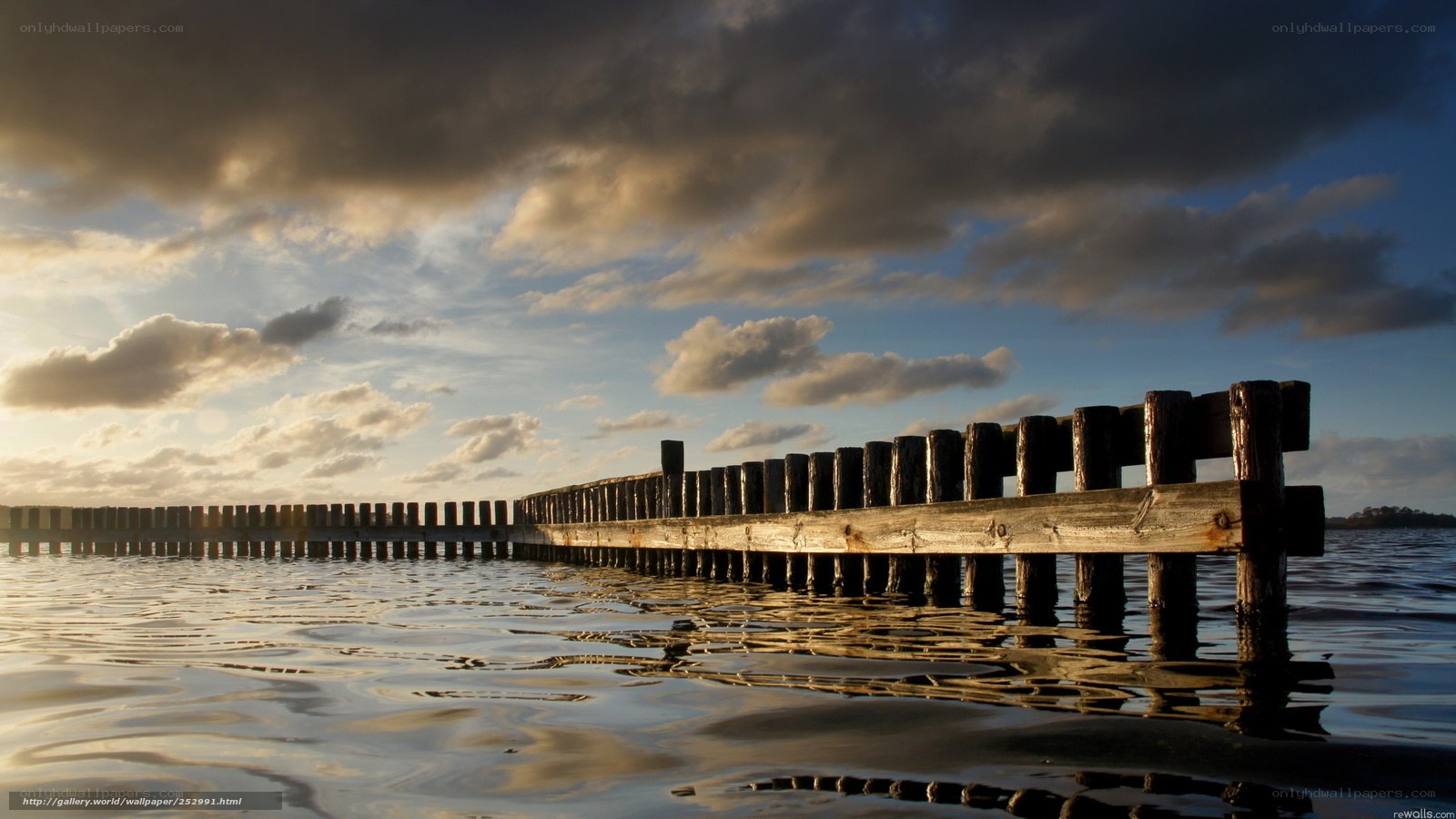 Wooden pier at sunset