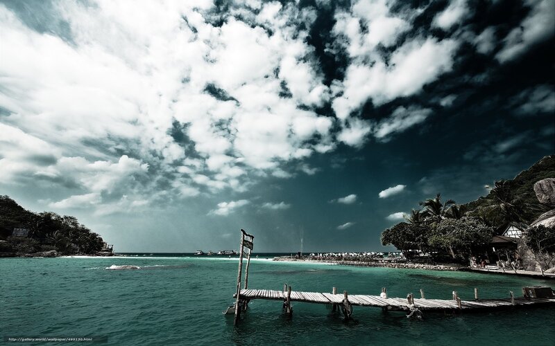 Wooden pier at tropical beach