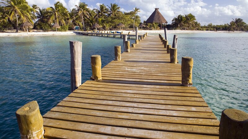 Wooden pier at tropical beach
