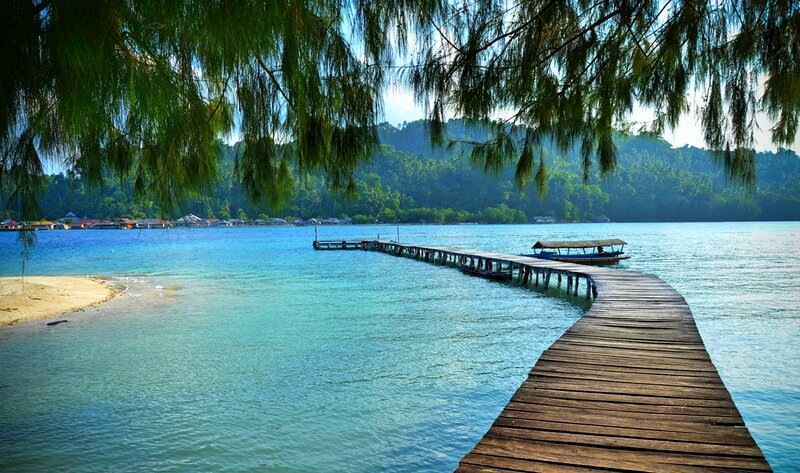Wooden Pier at Tropical Beach — Blue, Serene, Afternoon, Photograph