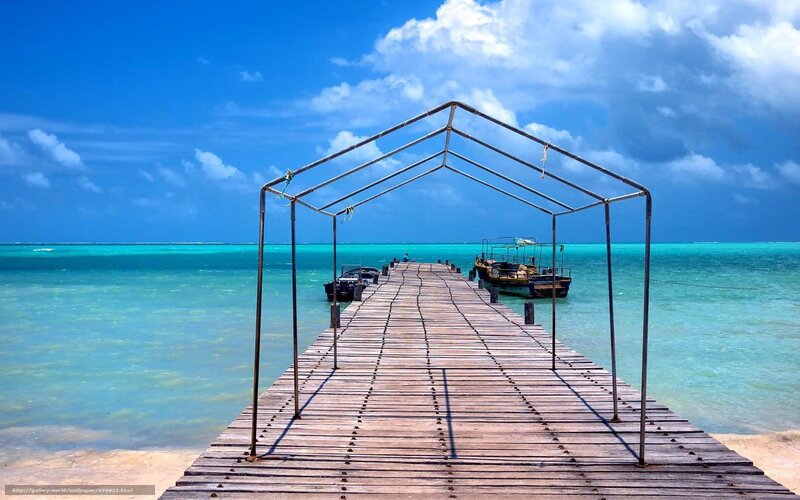 Wooden pier at tropical beach
