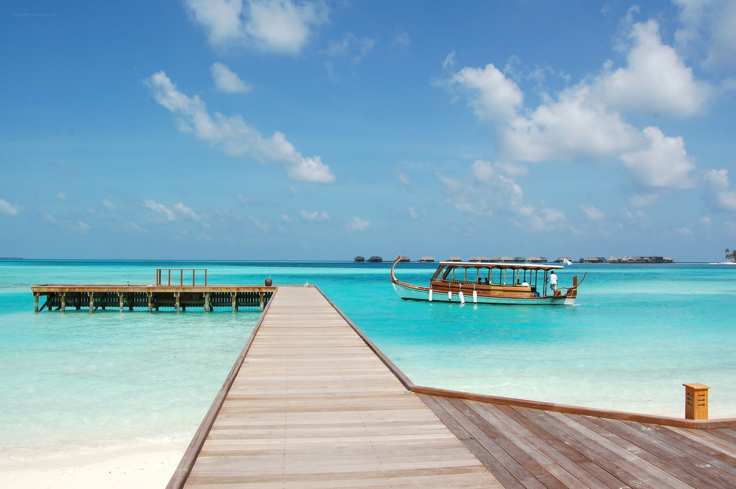 Wooden pier at tropical resort