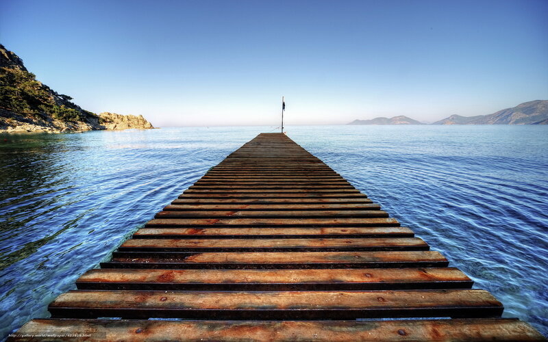 Wooden Pier Extending into Sea — Blue, Serene