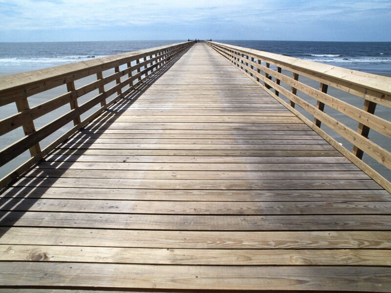 Wooden pier extending into the ocean