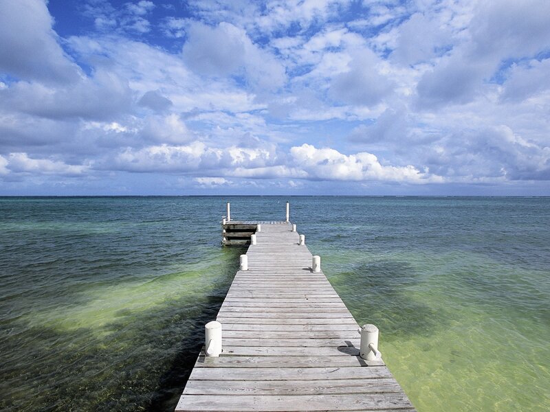 Wooden pier extending into the sea