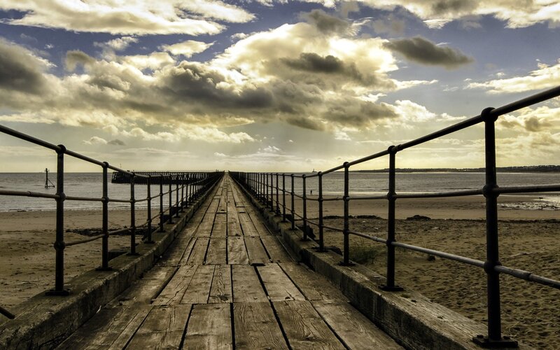 Wooden pier extending into the sea